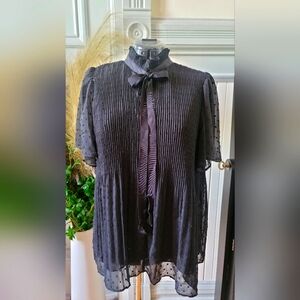 Black blouse with ribbon front tie and ruffles